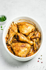 Oven roasted chicken with cabbage in baking dish. Space for text.