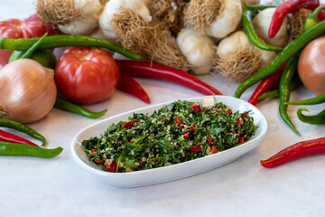 Tabboule appetizer. Traditional Turkish and Arabic cuisine meze. Snack meal served alongside the main course. Natural vegetarian food. Local name taboule mezze.