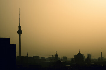 Silhouette of a city scape view of Berlin in the morning at sunrise.