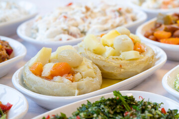 Artichoke Salad Appetizer. Healthy food. Traditional Turkish and Arabic cuisine meze. Bulk appetizer plates. Natural vegetarian food. Local name enginar salatası