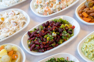 Mexican salad. Healthy food. Snack meal served alongside the main course. Natural vegetarian food. Bulk appetizer plates.