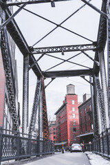 Naklejka premium industrial looking view of bridge alley
