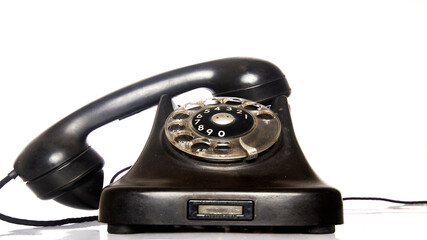 vintage black phone isolated on white