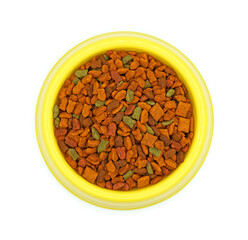 Dry cat food in yellow bowl, Granular feed for pet, Isolated on white background, Top view