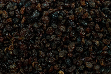 Raisins scattered all over the background.