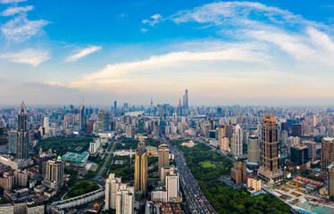Fototapeta na wymiar Shanghai skyline and buildings with highway at sunset.