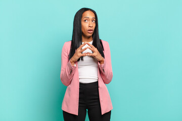 young black woman scheming and conspiring, thinking devious tricks and cheats, cunning and...