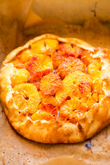 Blood orange tart, with almonds and sugar 
