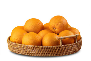 wide flat rattan basket with ripe oranges, clipping isolate on a white background