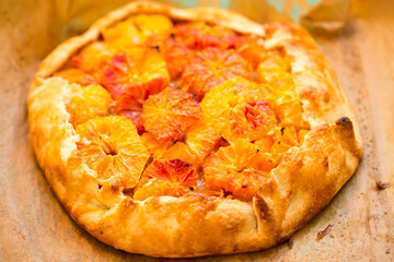 Blood orange tart, with almonds and sugar 
