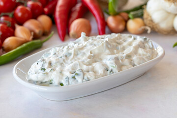 healthy vegetarian food, purslane salad with yoghurt. Traditional Middle Eastern Appetizer