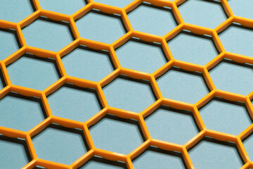 Yellow hexagonal grid cells on light blue background