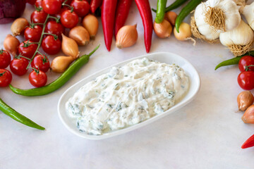 healthy vegetarian food, purslane salad with yoghurt. Traditional Middle Eastern Appetizer