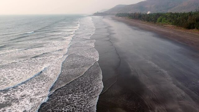 Aerial footage of Ladghar beach at Dapoli, located 200 kms from Pune on the West Coast of Maharashtra India.