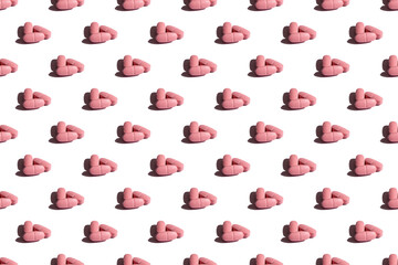 Pills on a white background. Pink pill pattern. Hard shadows