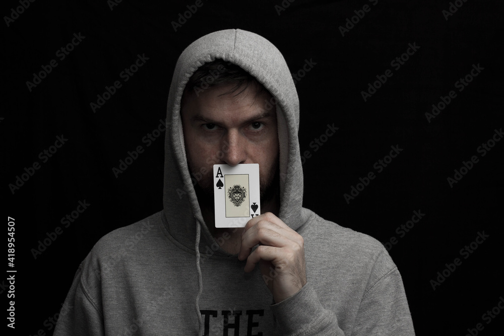 Sticker Man in hoodie with playing cards in his hand 