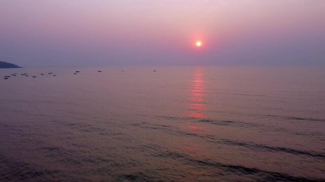 Fishing boats anchored off Ladghar beach at Dapoli, located 200 kms from Pune on the West Coast of Maharashtra India.
