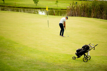 Young man playing golf