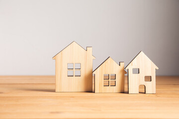 wooden house models on table