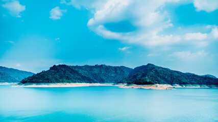 Fototapeta premium Panorama scenic of Mountain and lake landscape in blue at Pasak Chonlasit Dam in Nakornnayok Thailand