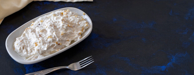 Healthy vegetarian dish, traditional Middle Eastern flavored celery salad with yogurt and apples. Mezze served alongside the main course. Appetizer. copy space