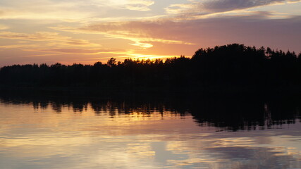 Obraz premium sunset over the river