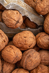 Close-up walnuts pile. Walnut cracker