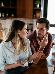 Boyfriend and girlfriend are arguing. Jealous girlfriend having an argument with her boyfriend