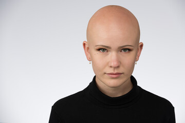 Young urban woman with blue eyes and a fair complexion poses for the camera.
