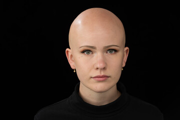 Young urban woman with blue eyes and a fair complexion poses for the camera.