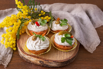 Salt cupcakes on the wood with mimosa