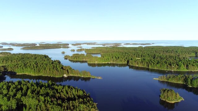 Nordic sea landscape with green forest islands