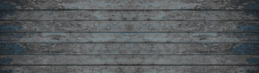 Naklejka premium old blue gray grey painted exfoliate rustic wooden boards texture - wood background banner panorama long shabby