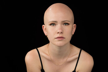 Young urban woman with blue eyes and a fair complexion poses for the camera.