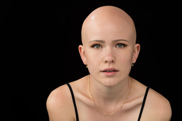 Young urban woman with blue eyes and a fair complexion poses for the camera.