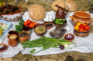 Russian folk food, on the tablecloth.