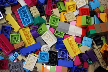 A many colorful blocks from the children's construction model kit, a texture for the background