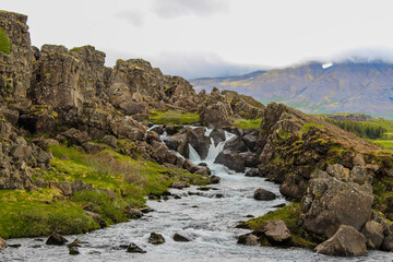 waterfall between 2 tectonic plates in Iceland