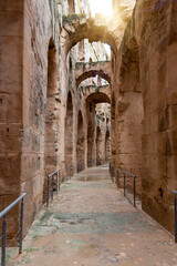 Fototapeta na wymiar Vaulted arched passage or enfilade of the Amphitheatre of El Jem, Tunisia.