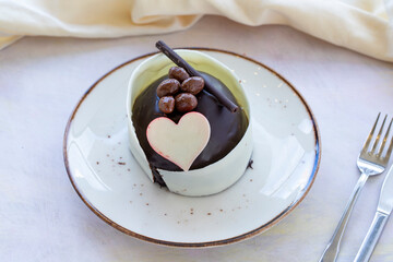 Special design cake. Valentine's day concept cake. White and Black chocolate cake