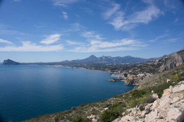 Obraz premium Sea waves lash line impact rock on the beach, located in Alicante, Spain, View