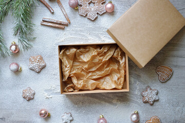 blank craft box on christmas background of cooking and food. baking home delivery concept.