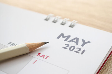 May month on 2021 calendar page with pencil business planning appointment meeting concept