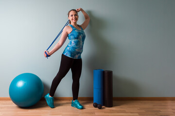Woman stand with quipment for fitness and myofascial release