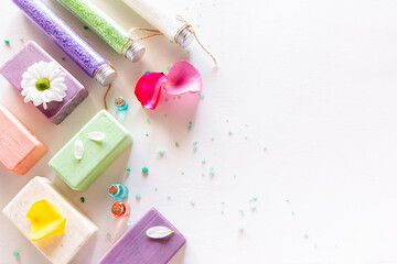 home made natural cosmetics, bath salt, soap on white background with place for text