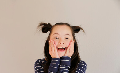 Cute smiling girl isolated on the grey background - 418979531