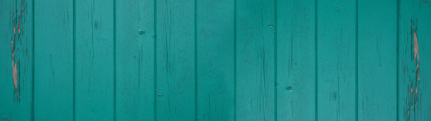 Obraz premium old abstract dark turquoise colorful painted exfoliate rustic wooden boards texture - wood background banner panorama long shabby