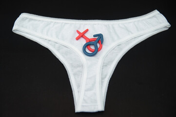 Gender conflict in women's white panties.