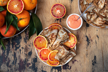 Traditional french crepes with red bloody oranges