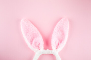Bunny rabbits on pink background. Easter minimal concept. Top view, flat lay, copy space